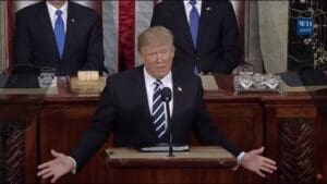 President Donald Trump at lectern in U.S. Congress, giving speech on Feb 28 2017 (color photo)