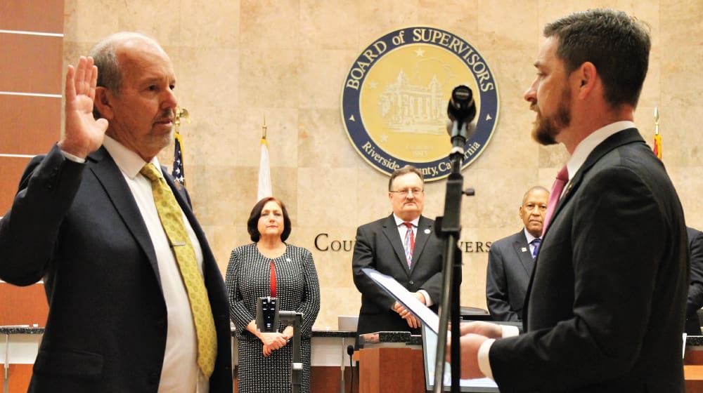 Jeff Hewitt being sworn in as Riverside County supervisor by Libertarian National Committee Chair Nicholas Sarwark on Jan. 8, 2019. Jeff Hewitt being sworn in as Riverside County supervisor by Libertarian National Committee Chair Nicholas Sarwark on Jan. 8, 2019.